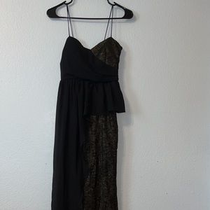 Long black/burnt greenish chrome prom dress with a side black vail.